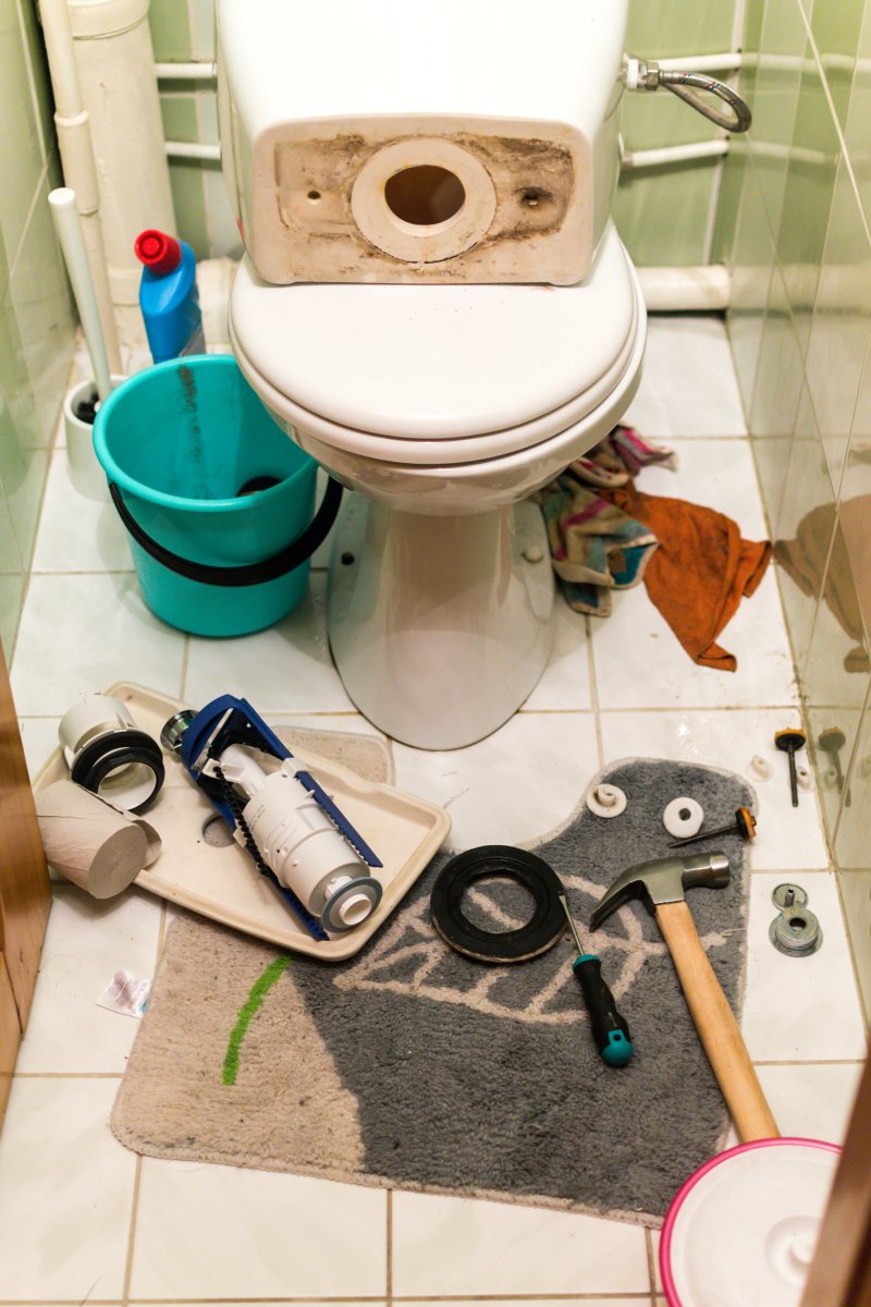 New toilet being installed in a Goffs Oak bathroom